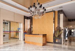 Lobbyen eller receptionen på Beijing Xinxiang Yayuan Apartment (Sanlitun)