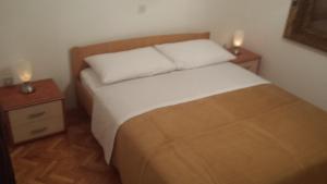 Postel nebo postele na pokoji v ubytování Apartment Gevera