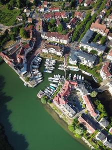 an aerial view of a harbor with boats in the water at STUDIO TRES PROPRE de 18 m2 in Cergy