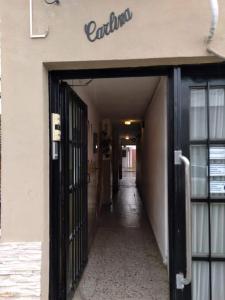 an entrance to a building with an open door at Carlina in Salta