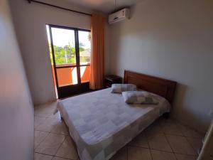 Voodi või voodid majutusasutuse Residencial Medeiros toas