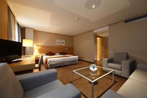 Postel nebo postele na pokoji v ubytování Eurohotel Castellón + 35 fotografií