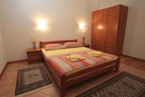 Posteľ alebo postele v izbe v ubytovaní Apartments Pinus