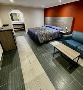 מיטה או מיטות בחדר ב-Hollywood INN - Downtown Houston