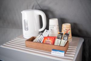 a tray with books and other items on a table at HIKARI DOME - Vacation STAY 89725v in Teruma