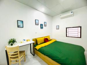 Ein Bett oder Betten in einem Zimmer der Unterkunft Hanoi Sunrise Homestay Long Biên