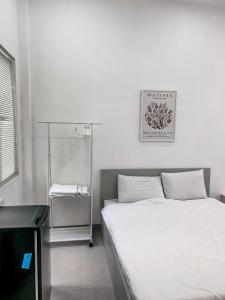 Postel nebo postele na pokoji v ubytování Chingu Vũng Tàu Home