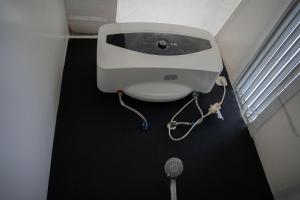 a bath room with a sink at Leuweung Geledegan Ecoldge 