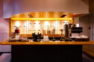 a bar in a restaurant with a counter top at TAOYA Nikko Kirifuri in Nikko +30 photos