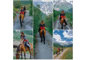 een vrouw op een paard op een onverharde weg bij Guest house Data in Ushguli