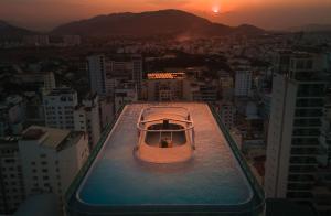 a small boat sitting on top of a building at Grand Tourane Nha Trang Hotel in Nha Trang