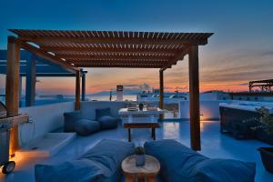 Posedenie v ubytovaní The Nine Graces - Agios Prokopios Beach Apartments -Option with terrace and jacuzzi