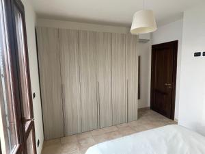 A bed or beds in a room at Casa Vacanza SUN & RELAX