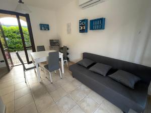 A seating area at Casa Vacanza SUN & RELAX