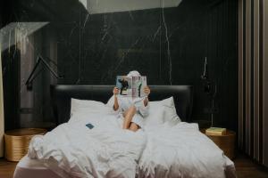 Postel nebo postele na pokoji v ubytování Guesthouse Suiteseven