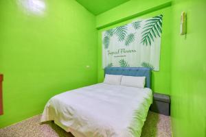 Llit o llits en una habitació de Chunfa B&B