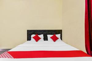 Katil atau katil-katil dalam bilik di Flagship Hotel Suman Niwas