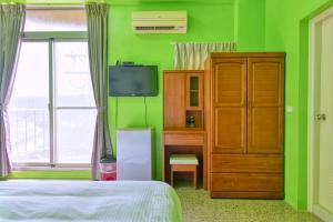 Llit o llits en una habitació de Chunfa B&B