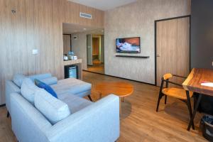 Televízia a/alebo spoločenská miestnosť v ubytovaní The Zuri Dumai