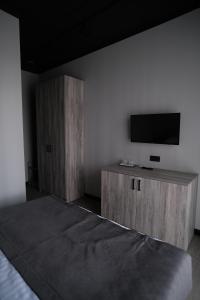 Postel nebo postele na pokoji v ubytování Vip Avtim hotel