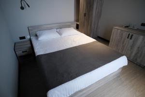 Postel nebo postele na pokoji v ubytování Vip Avtim hotel