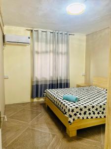 Ένα ή περισσότερα κρεβάτια σε δωμάτιο στο Campement a flic en flac