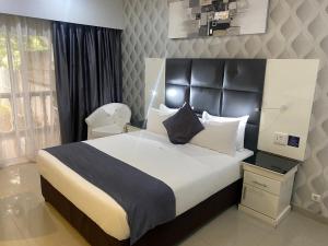 TETE PALM HOTEL客房内的一张或多张床位