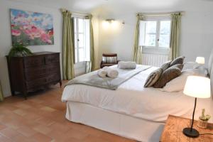Posteľ alebo postele v izbe v ubytovaní B&B Can Jan