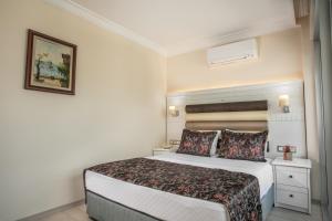 Postel nebo postele na pokoji v ubytování Arbatt Marmaris Hotel