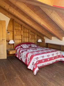 Postel nebo postele na pokoji v ubytování Alpino Charme Apartments