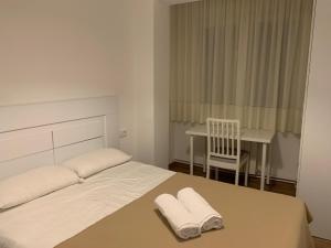 Кровать или кровати в номере Vibes Coruña-Outeiro 293