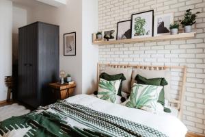 Ένα ή περισσότερα κρεβάτια σε δωμάτιο στο Loft apartment with balcony in centre