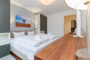 Ein Bett oder Betten in einem Zimmer der Unterkunft Villa Limora, App. 04