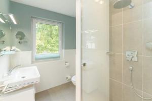 Ein Badezimmer in der Unterkunft Villa Limora, App. 04