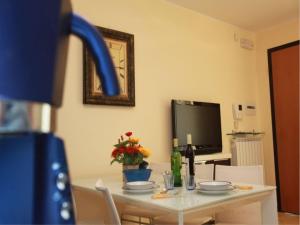 Kuchyň nebo kuchyňský kout v ubytování Beachfront apartment in Rosolina Mare