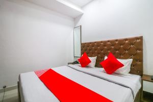 Säng eller sängar i ett rum på Hotel SkyCity