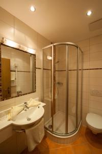 Koupelna v ubytování Rustika - Appartements & Spa