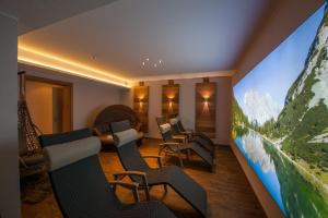 TV a/nebo společenská místnost v ubytování Rustika - Appartements & Spa