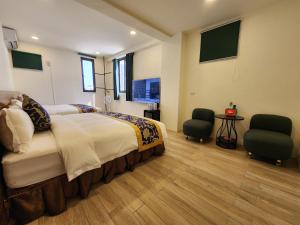 TV in/ali zabaviščno središče v nastanitvi Penghu Dayou View B&B