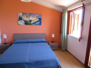Posteľ alebo postele v izbe v ubytovaní Testa di Monaco - Basic Beach Accommodations