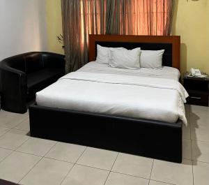 Katil atau katil-katil dalam bilik di Whitehouse Msquare Hotel