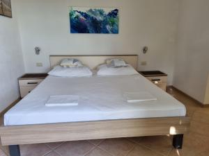 Postel nebo postele na pokoji v ubytování Guesthouse Dominović