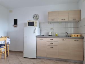 Kuchyň nebo kuchyňský kout v ubytování Guesthouse Dominović