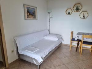 Postel nebo postele na pokoji v ubytování Guesthouse Dominović