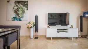 TV a/nebo společenská místnost v ubytování Duquesa Village 16,62,32