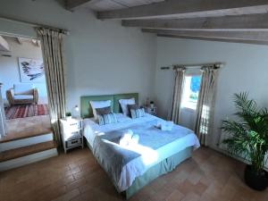 Posteľ alebo postele v izbe v ubytovaní B&B Can Jan