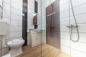 Koupelna v ubytování Local da Trindade Guesthouse + 19 fotografií