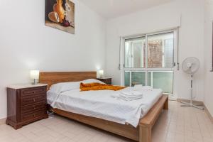 Postel nebo postele na pokoji v ubytování Local da Trindade Guesthouse