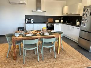 Kuchyňa alebo kuchynka v ubytovaní le Pied à Terre 2 PORTICCIO