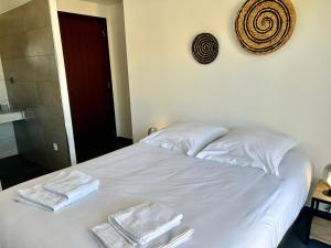 Posteľ alebo postele v izbe v ubytovaní le Pied à Terre 2 PORTICCIO